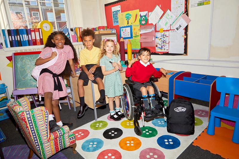 Four children in a school classroom