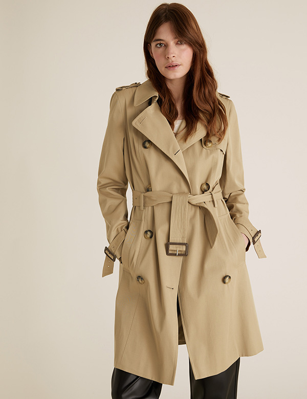 Woman wearing a mac coat from M&S